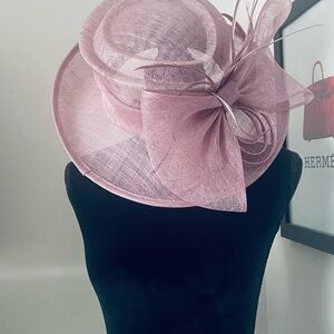 Kentucky Derby Hat. 
Beautiful Light mauve In New Condition, 
Worn once indoors.